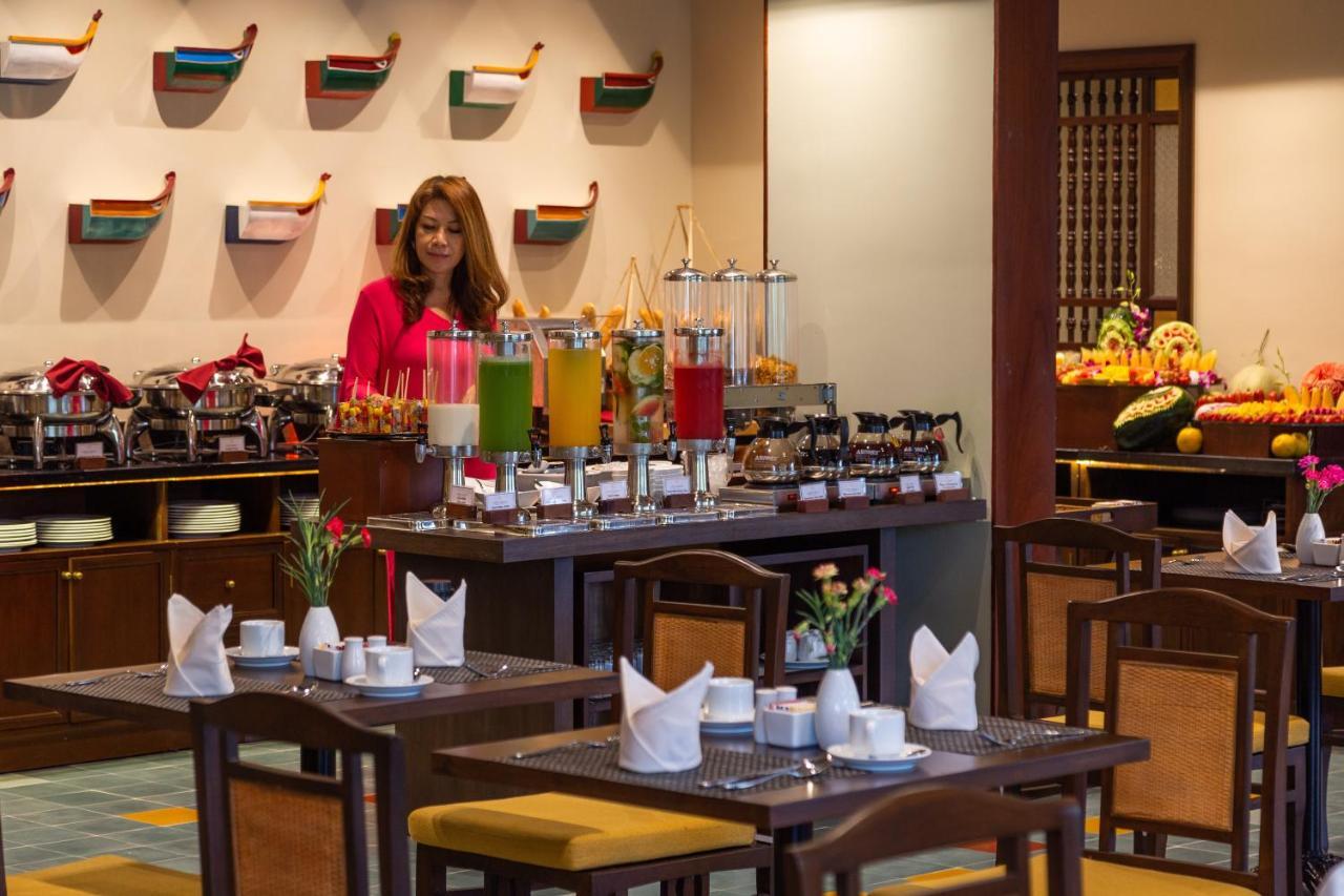 Cozy Savvy Boutique Hotel Hoi An Exterior foto The restaurant at the hotel