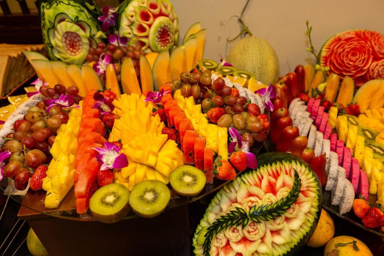 Cozy Savvy Boutique Hotel Hoi An Exterior foto Fruit carving