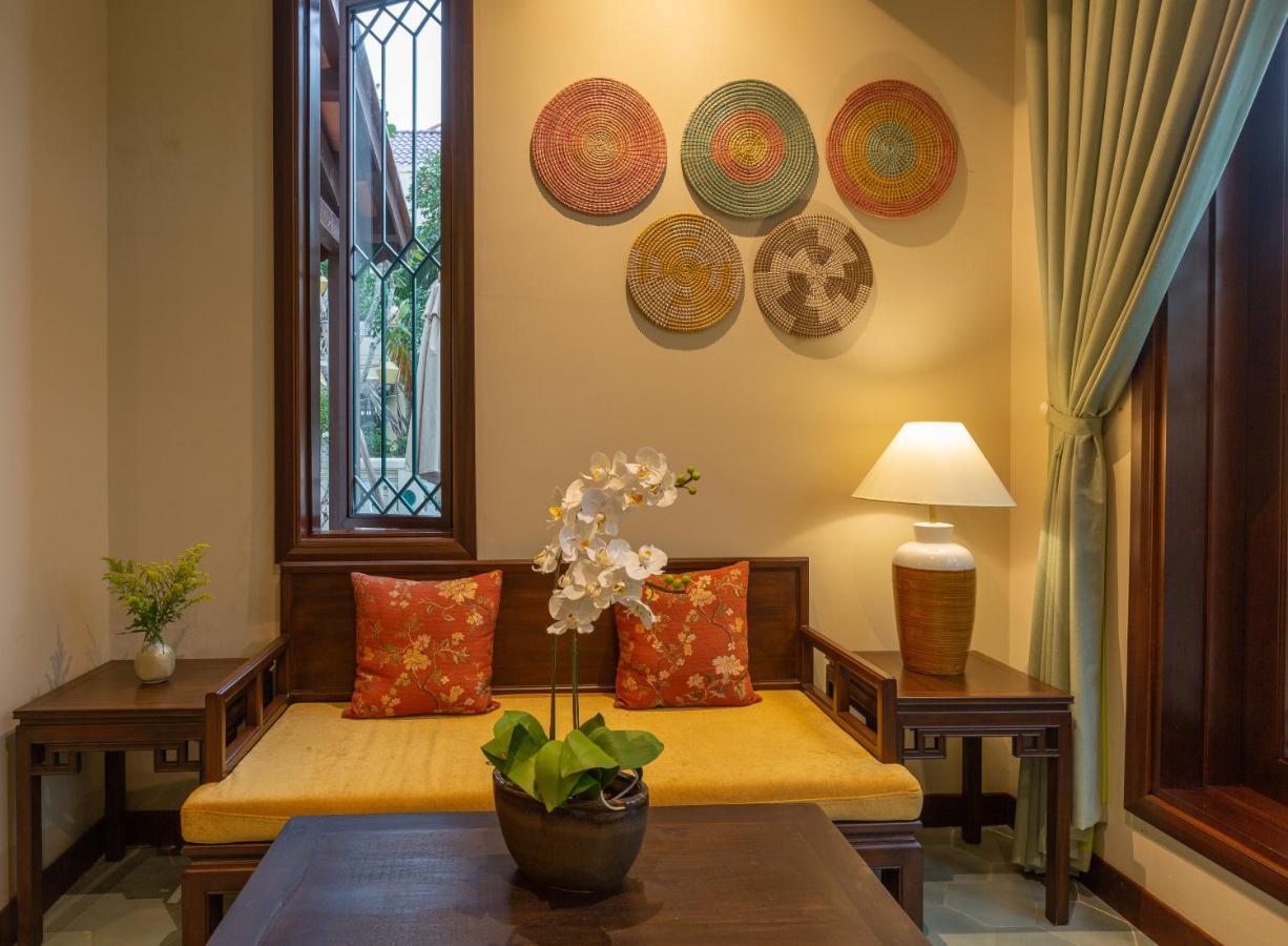 Cozy Savvy Boutique Hotel Hoi An Exterior foto Interior of a suite at the hotel